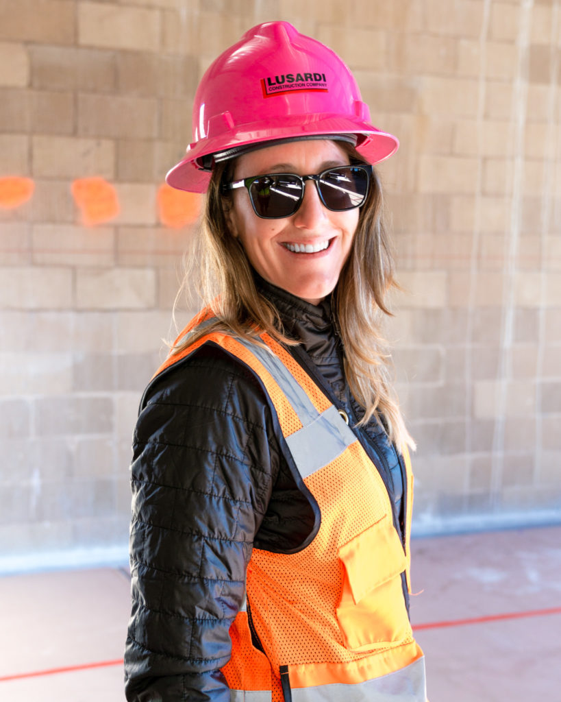 women smiling with ppe